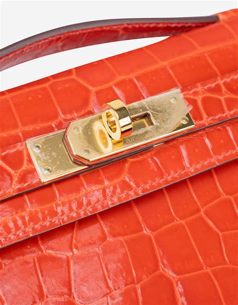 Hermès Orange Poppy Kelly Cut of Porosus Crocodile with